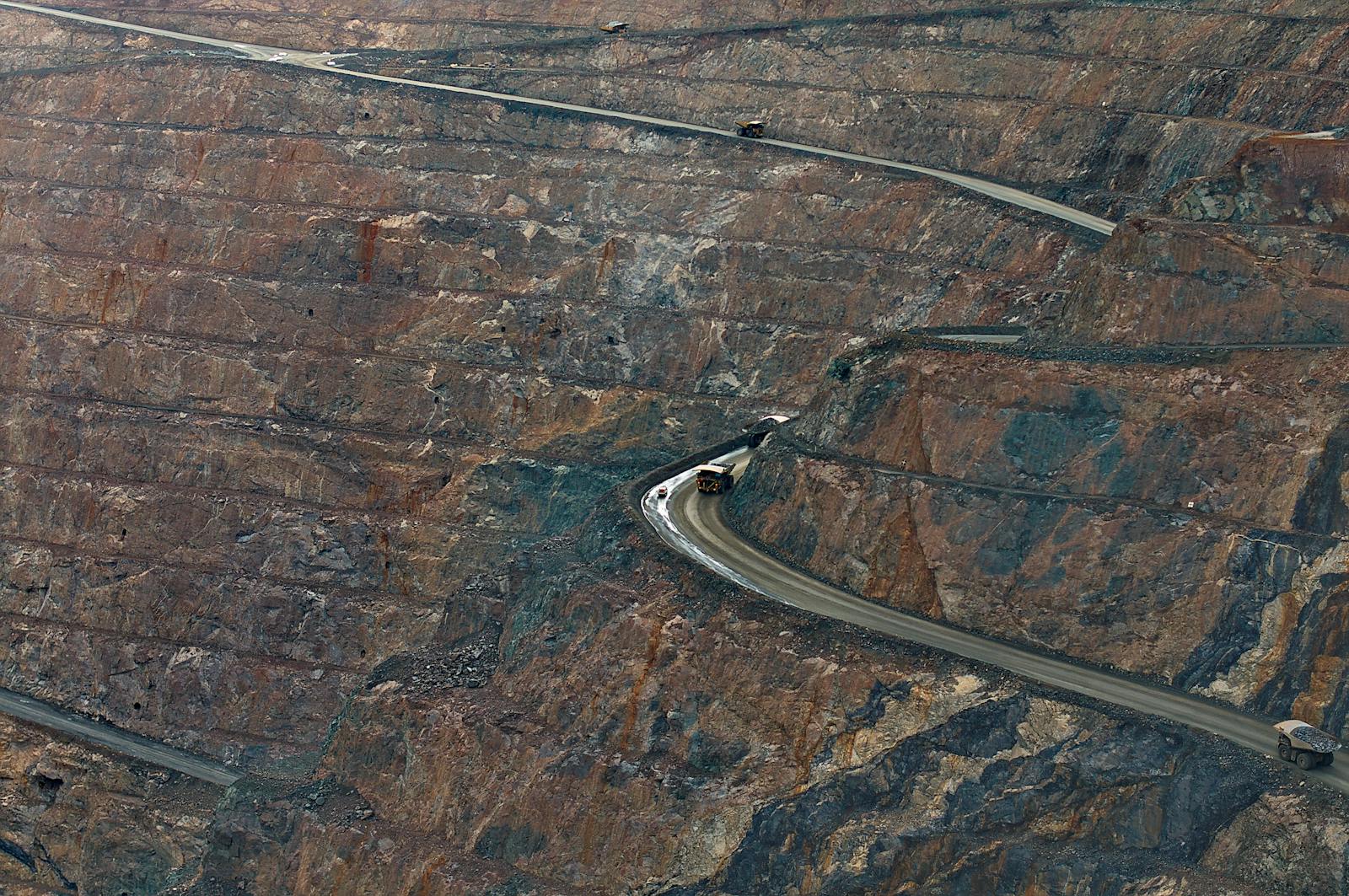 Mining truck on an open-cut site — sector-specific AI for the industries that build the world.